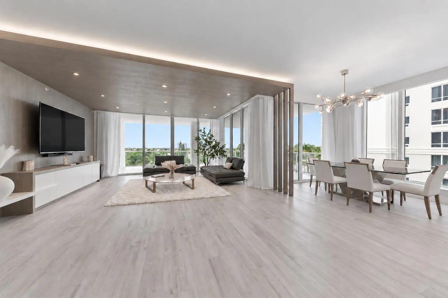Living Room Lutron Shades up