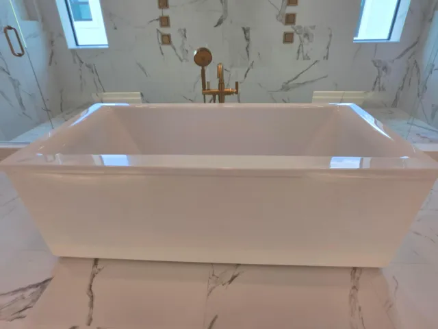 Primary Bathroom Kohler 6' freestanding tub with floor mounted faucet
