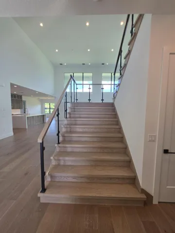 5ft wide white oak stairs with glass railing