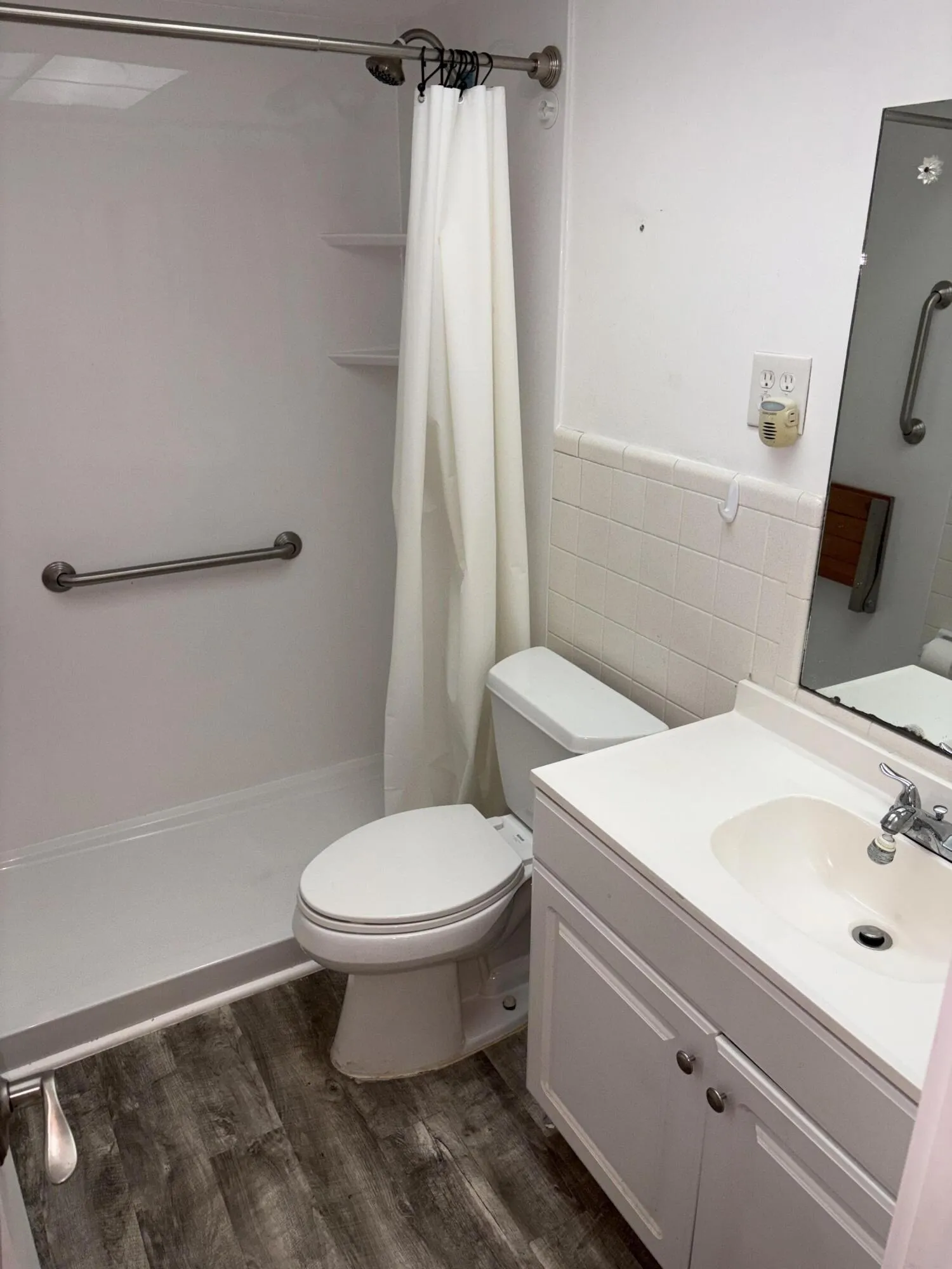 bath with step in Jacuzzi shower fitter