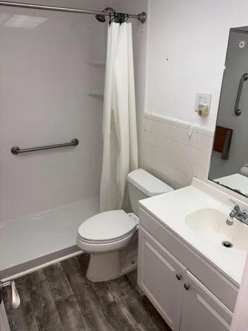 bath with step in Jacuzzi shower fitter
