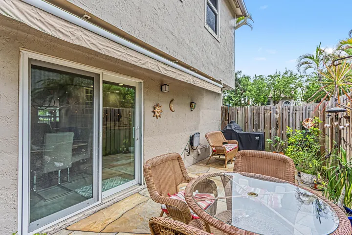 Outdoor living with privacy off the kitchen