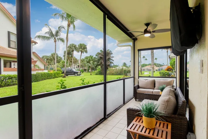 Screened patio with "Florida Fiberglass Screen on the lower half to keep out debris and water while adding privacy
