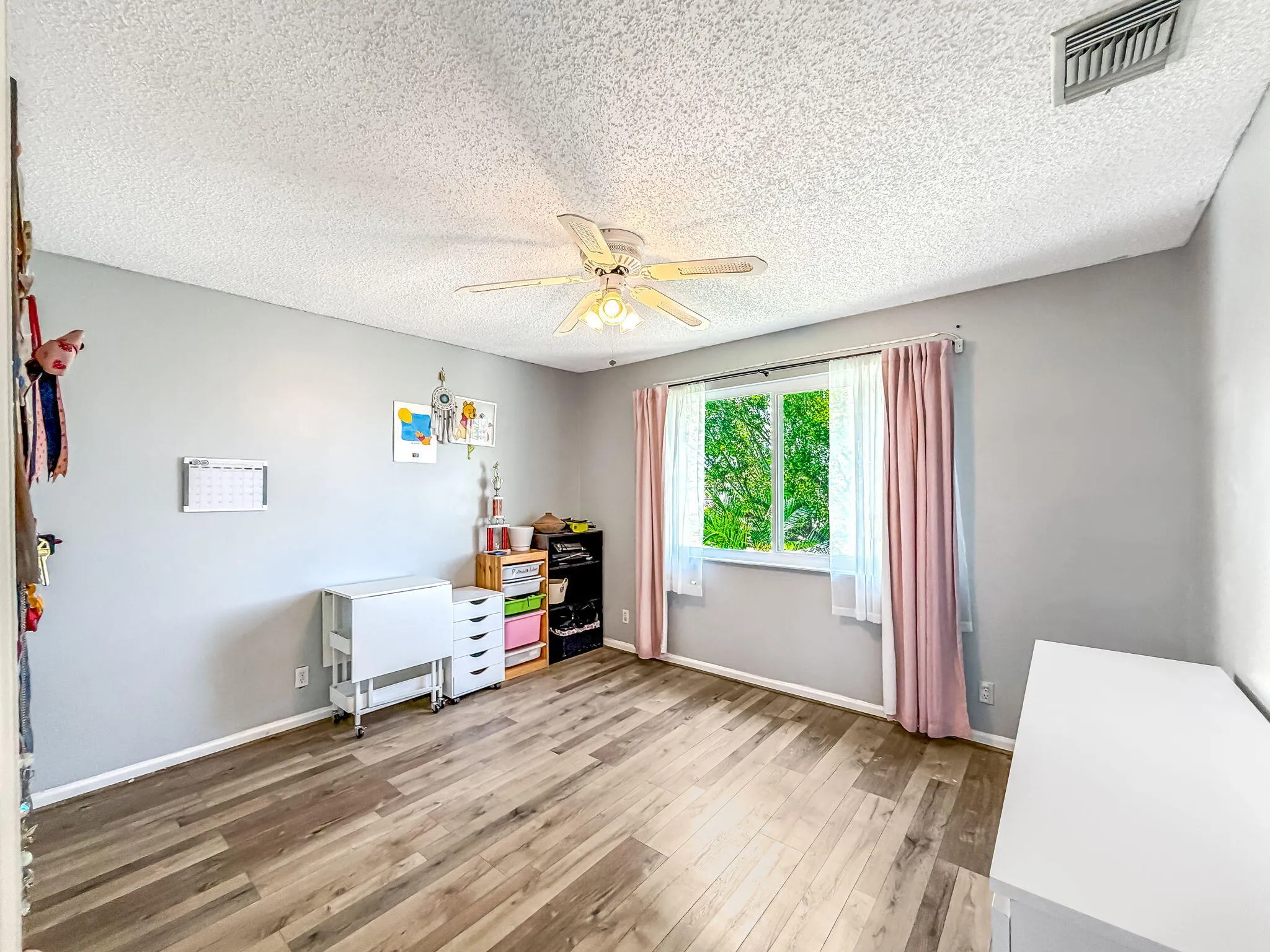 Wood-finish flooring with a contrasting accent wall