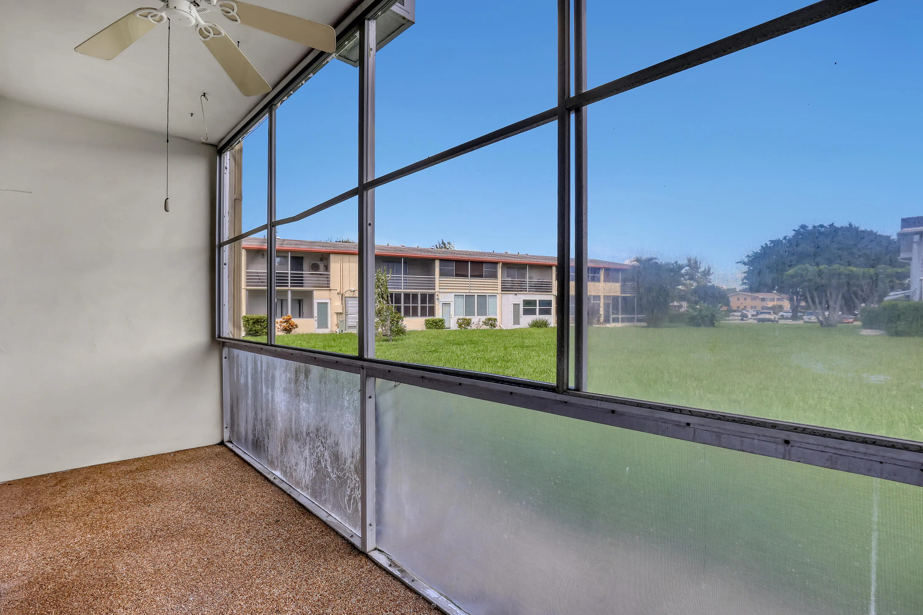 Enjoy fresh air, morning coffee, or a quiet afternoon from your screen porch.