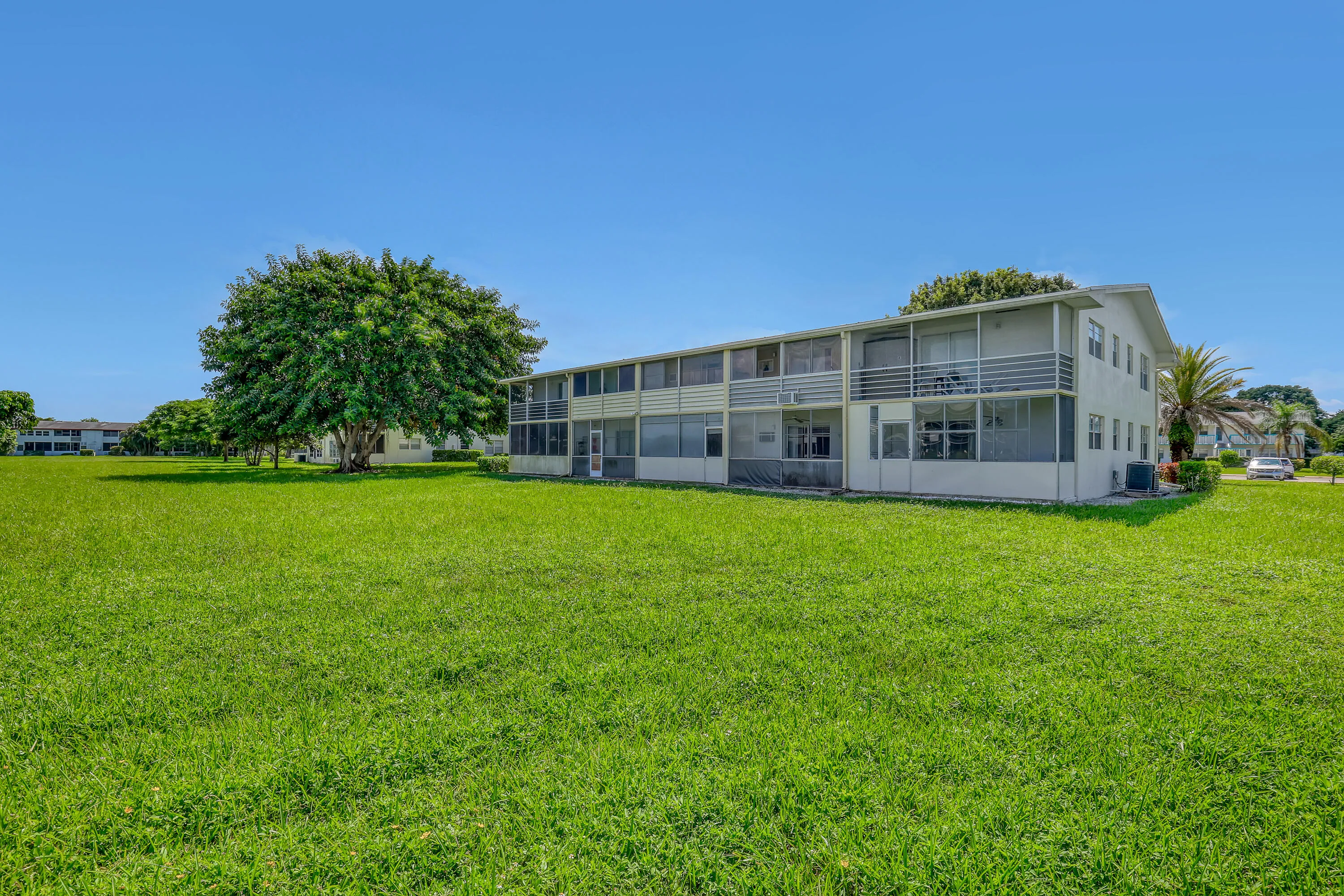 Open lawns and mature landscaping add to the relaxed community atmosphere.