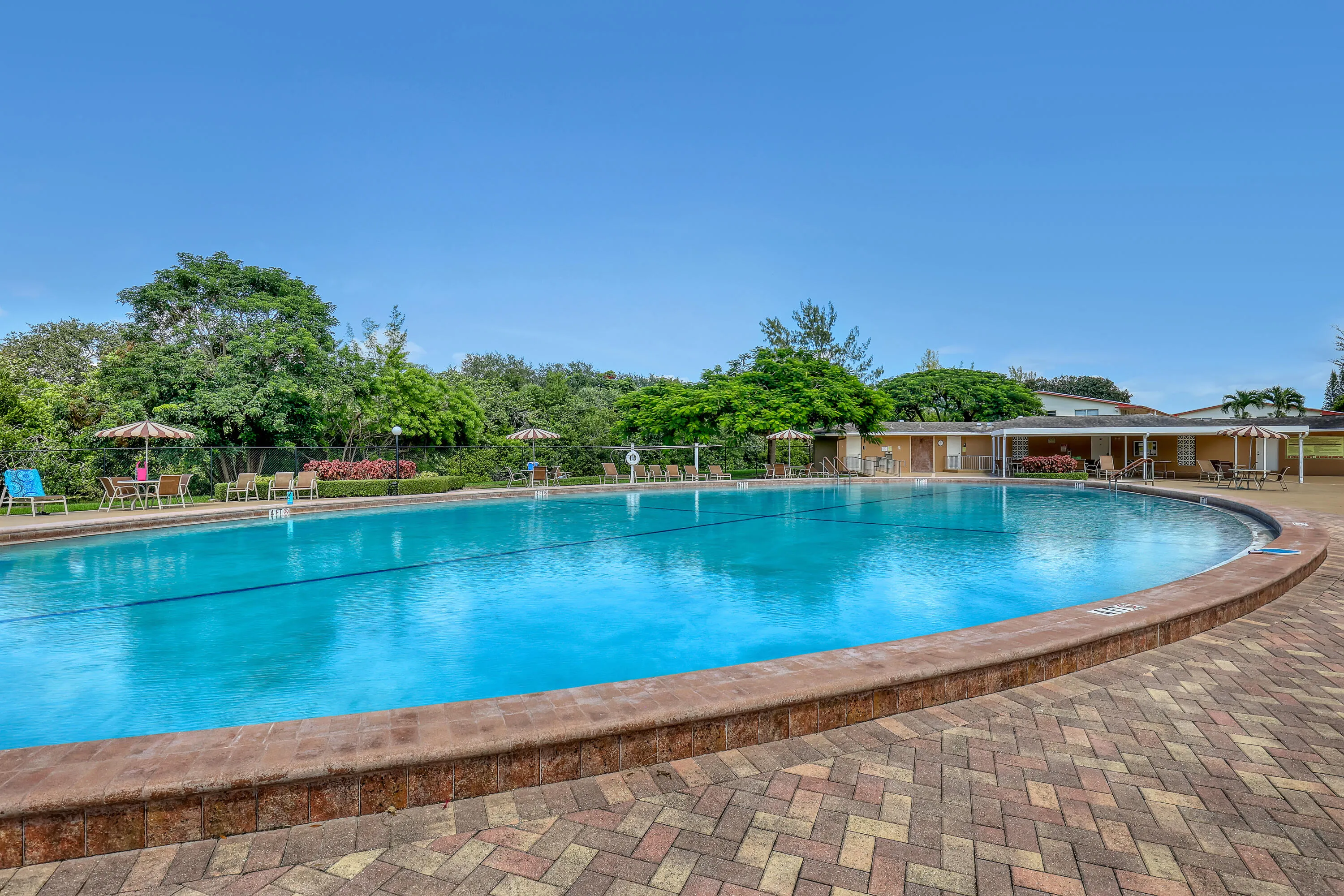 Spend sunny Florida days relaxing, swimming, and connecting with neighbors.