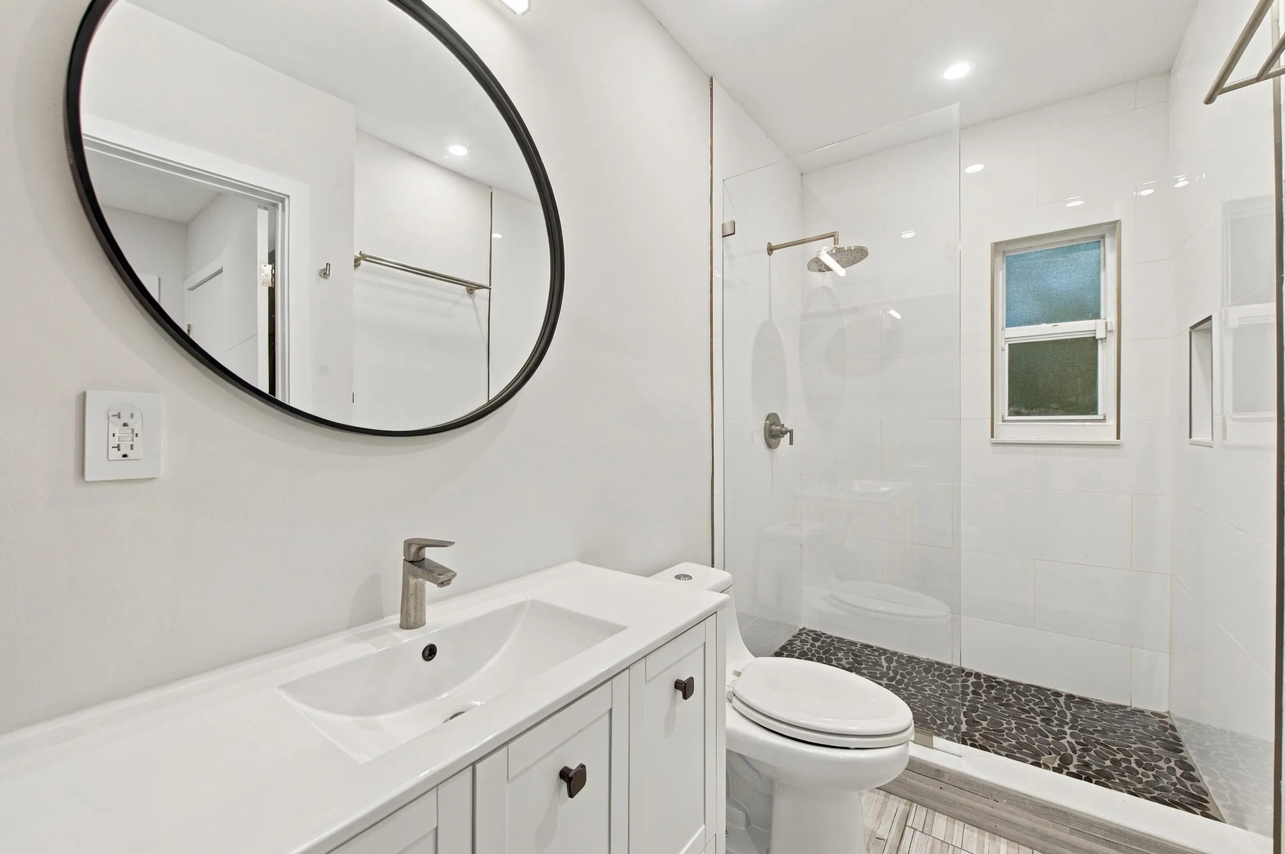Modern vanity with an integrated sink and brushed nickel faucet