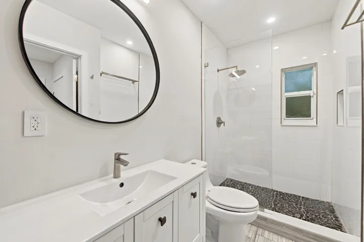 Modern vanity with an integrated sink and brushed nickel faucet