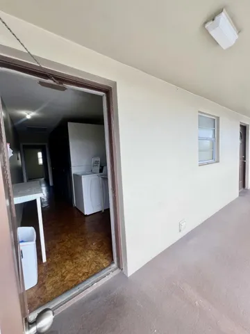 Washing Machine & Dryer right next to unit