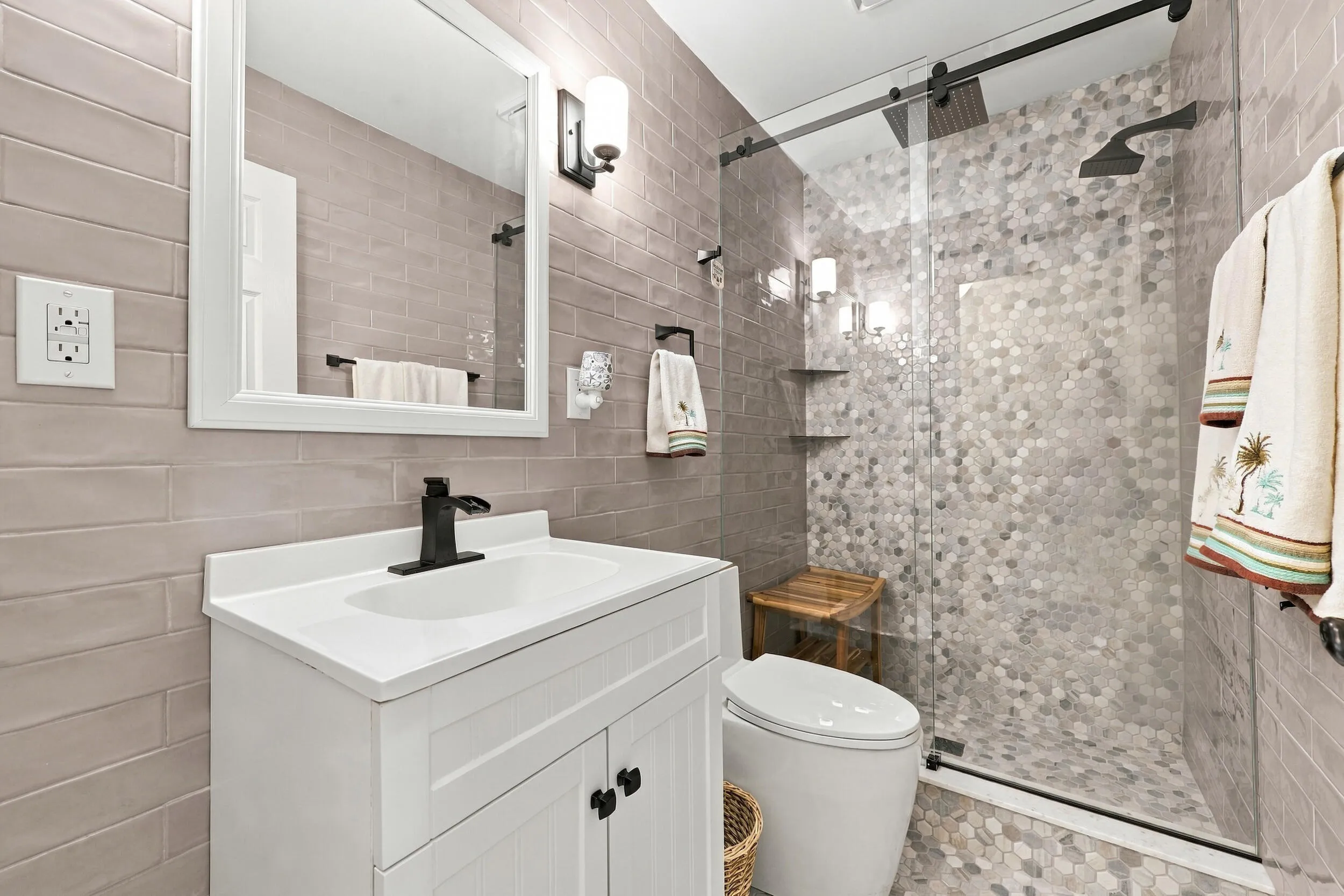 Bathroom 1 services all three of the guest bedrooms.