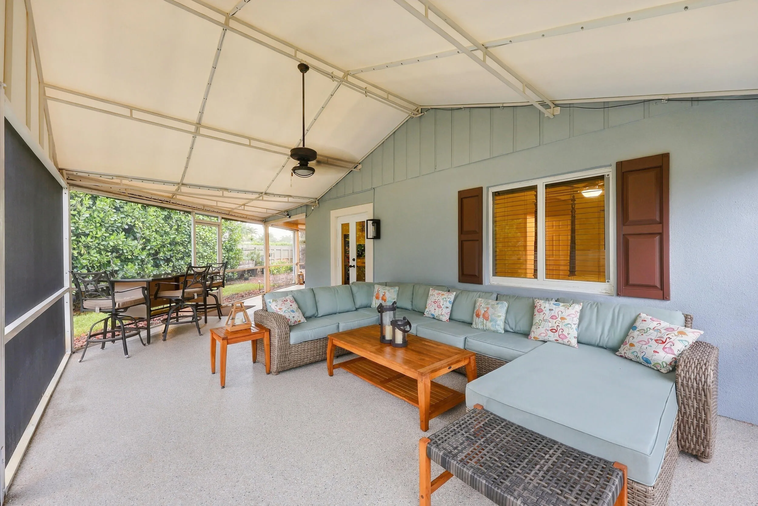 Live the epitome of the South Florida lifestyle with this 900 sq. ft. patio. It offers a built-in bar with quartz countertops, a built-in grill area with hooded exhaust, wood ceilings, recessed lights, tons of privacy and views of Lakeview Golf Course.