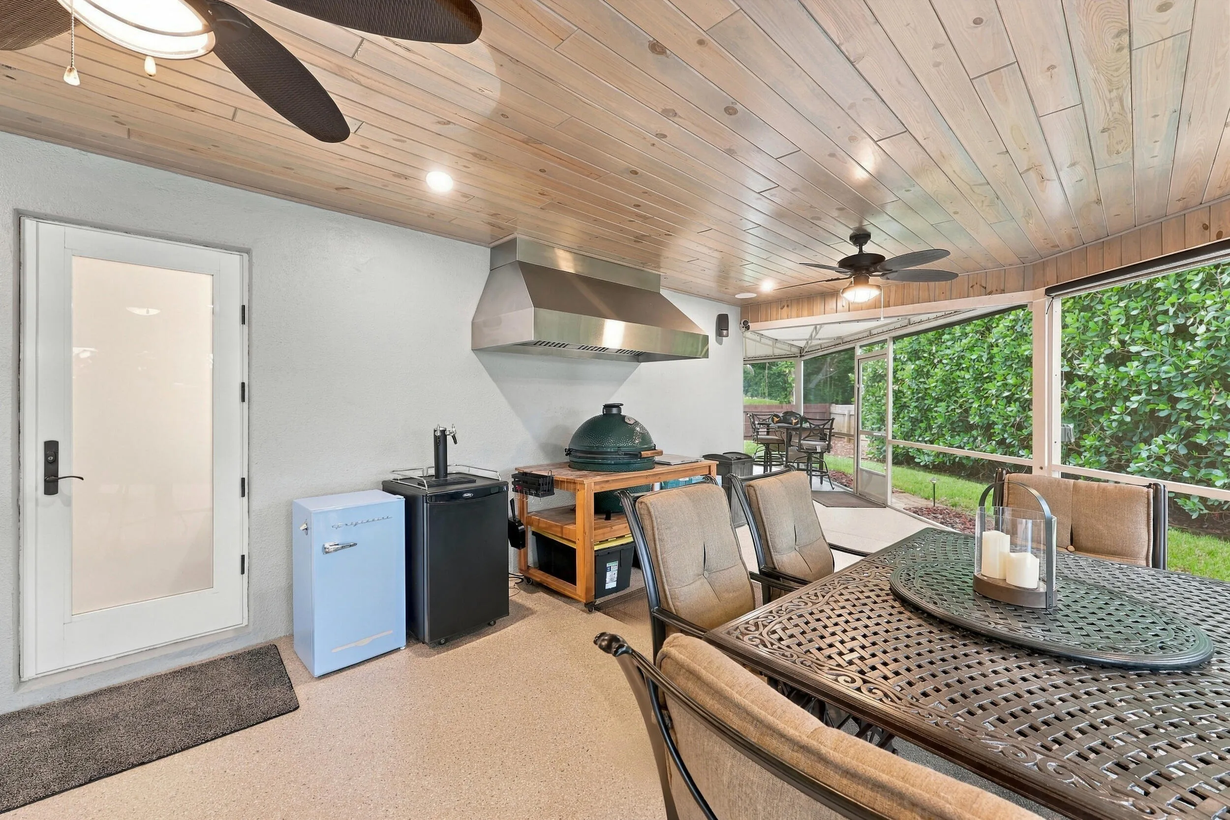 Live the epitome of the South Florida lifestyle with this 900 sq. ft. patio. It offers a built-in bar with quartz countertops, a built-in grill area with hooded exhaust, wood ceilings, recessed lights, tons of privacy and views of Lakeview Golf Course.