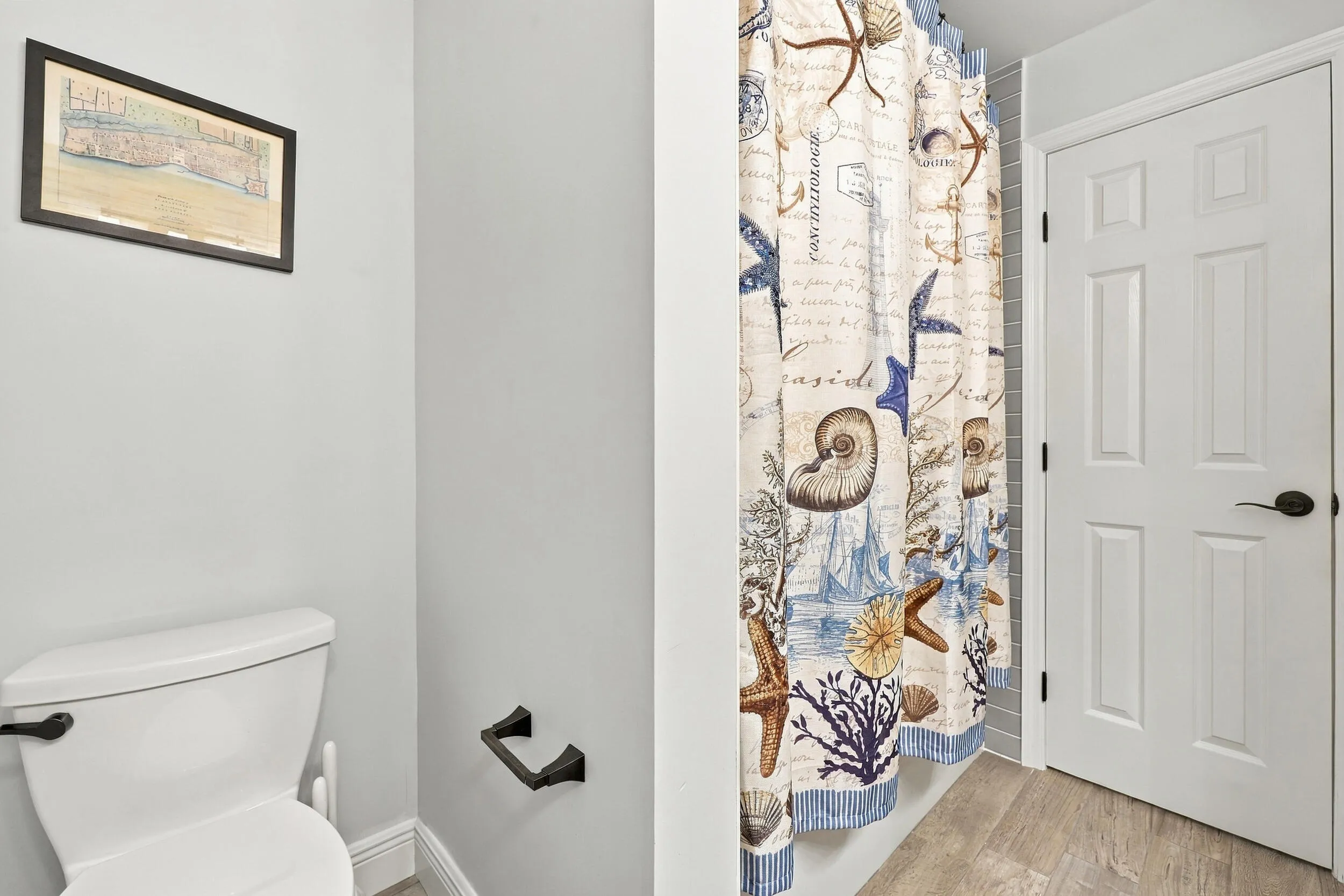 Bathroom 3 is a fully updated cabana bathroom with a new vanity, countertops, tile, and a tub and shower. Your guests will access it while spending days and evenings in the most beautiful backyard in Delray Beach.