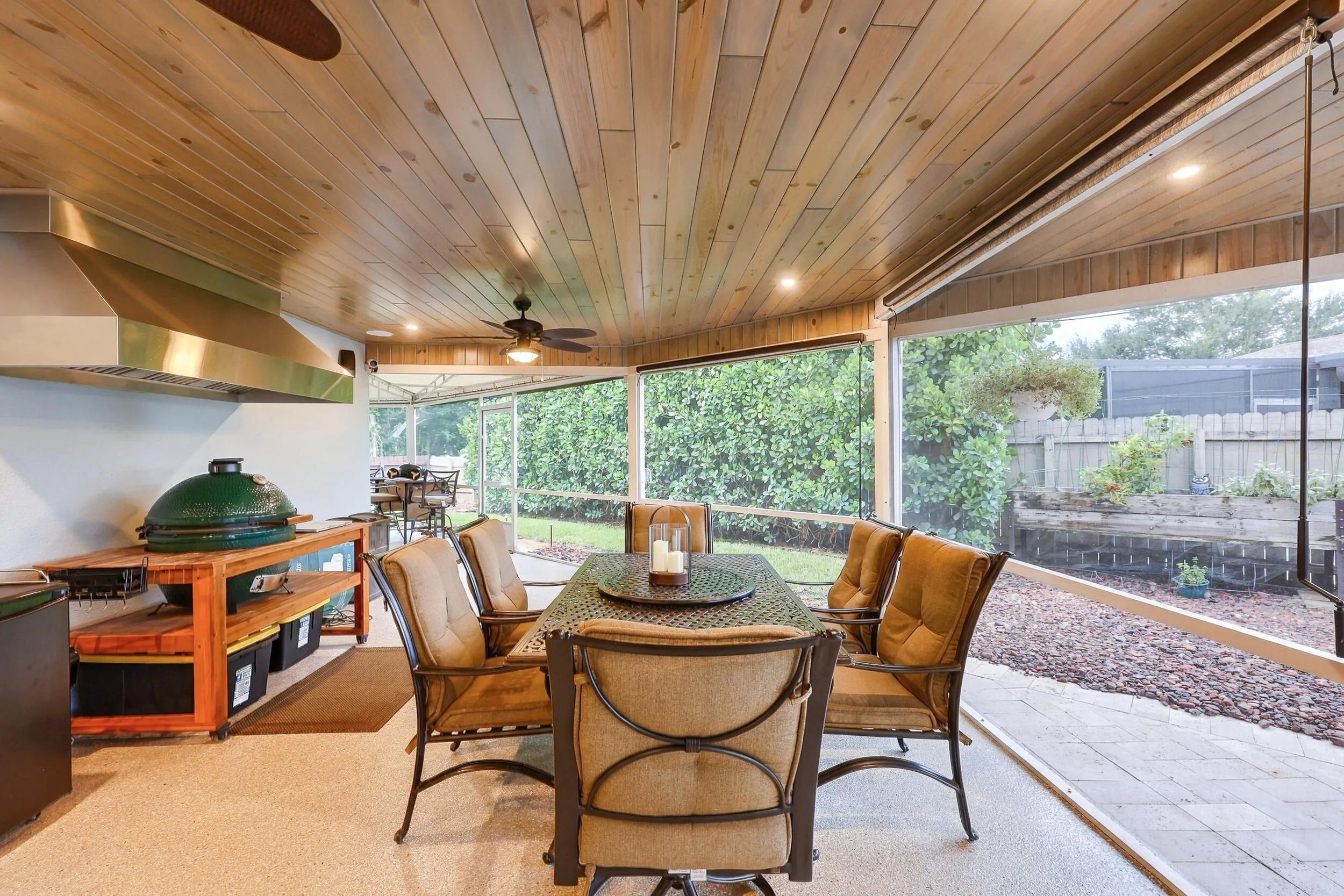 Live the epitome of the South Florida lifestyle with this 900 sq. ft. patio. It offers a built-in bar with quartz countertops, a built-in grill area with hooded exhaust, wood ceilings, recessed lights, tons of privacy and views of Lakeview Golf Course.