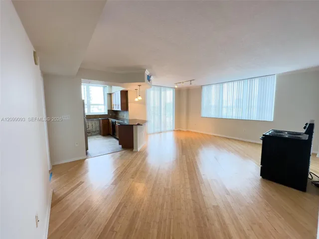 View to XL-living room and open eat-in kitchen