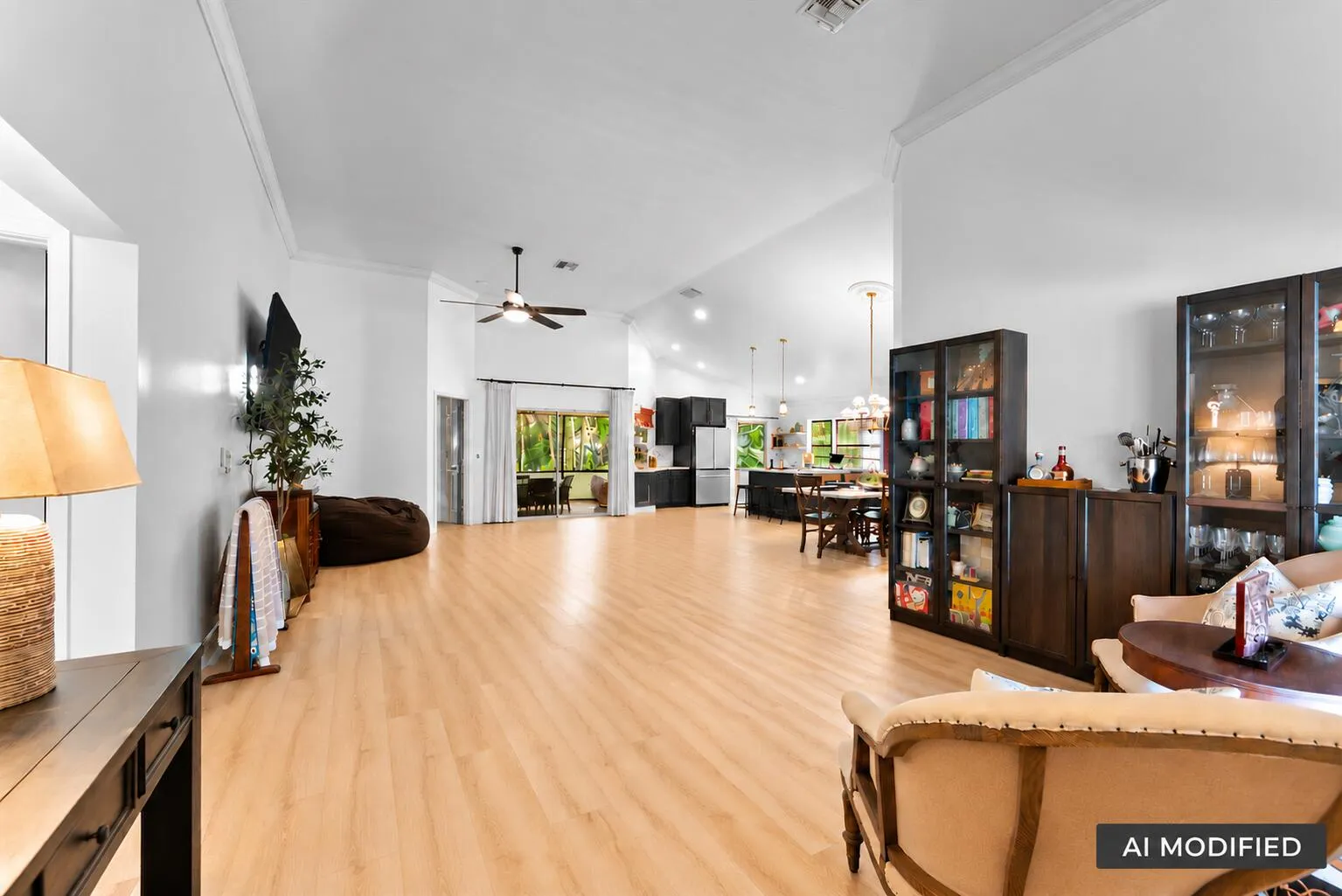 AI removed the large couch to show scale & openness of the area.