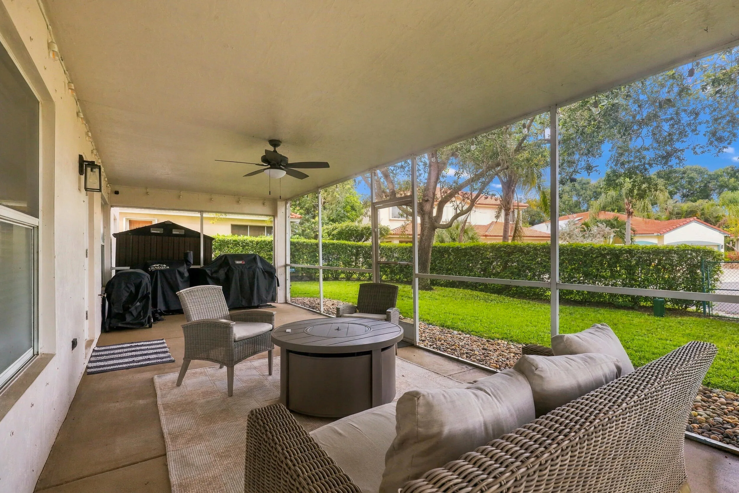 A 360 square foot covered and screened patio dramatically expands the home's entertaining space, with plenty of room to create both an outdoor living room and dining area for year round enjoyment. Whether hosting family and friends, dining outside, or simply unwinding at the end of the day, the combination of the expansive screened patio, lush hedges, full fencing, and complete rear privacy makes this a truly special outdoor setting.