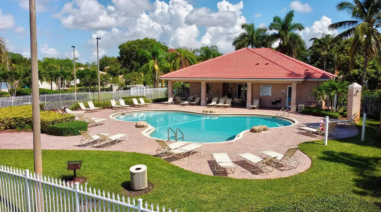 The gated community of Borgata sits in central Boynton Beach. It offers a beautiful clubhouse, gym, waterfront pool, and playground for the community's enjoyment.