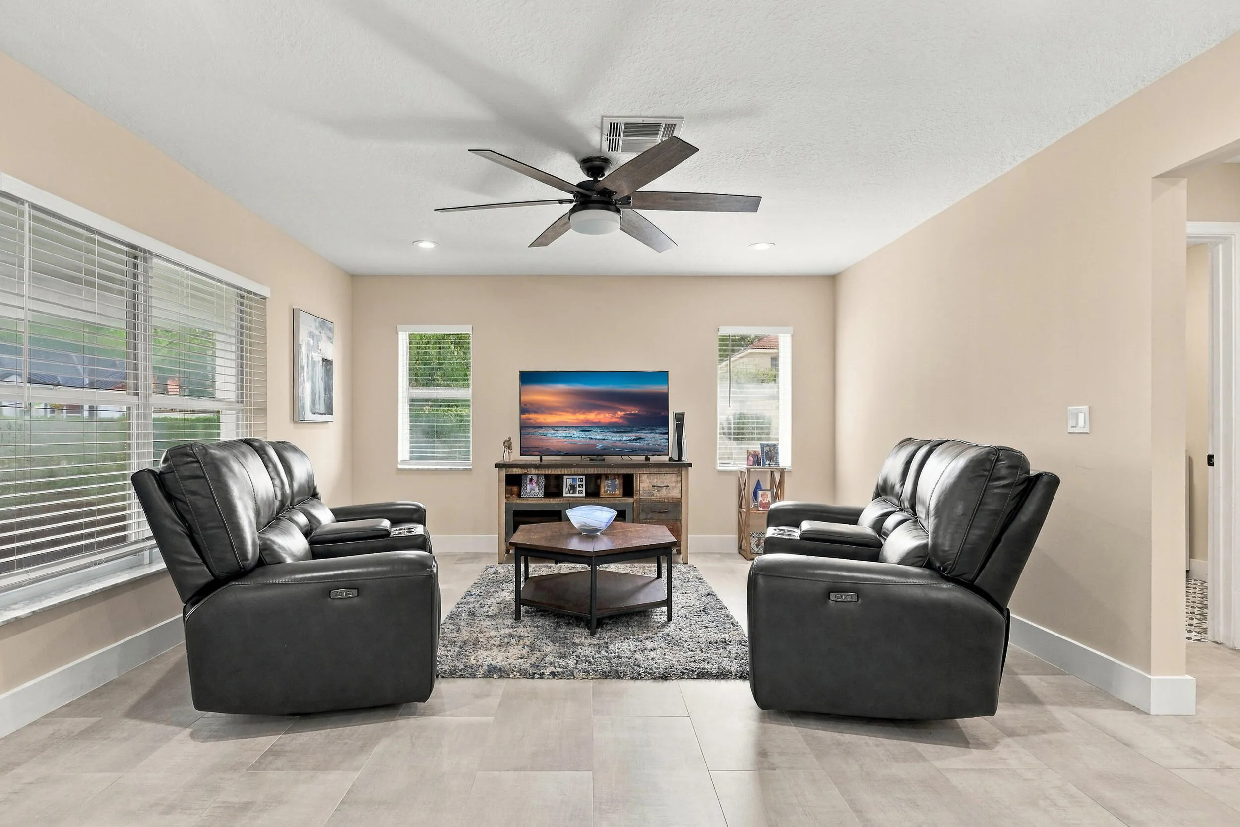 With an elegant and versatile floor plan, this home offers two distinct living areas on either side of the kitchen, creating a circular flow to the home's layout.