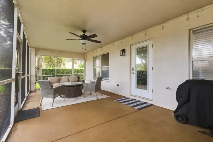 A 360 square foot covered and screened patio dramatically expands the home's entertaining space, with plenty of room to create both an outdoor living room and dining area for year round enjoyment. Whether hosting family and friends, dining outside, or simply unwinding at the end of the day, the combination of the expansive screened patio, lush hedges, full fencing, and complete rear privacy makes this a truly special outdoor setting.