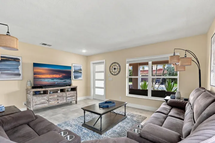 Striking from the moment you enter the front door, immediately you can tell this is a special property. Highlighted by new porcelain tile floors, the first impression is remarkable.