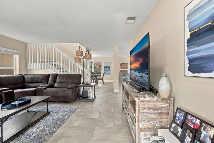 Striking from the moment you enter the front door, immediately you can tell this is a special property. Highlighted by new porcelain tile floors, the first impression is remarkable.