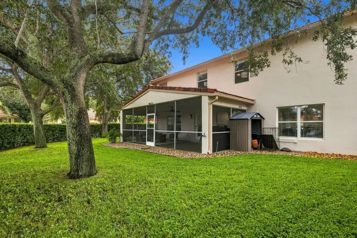 A 360 square foot covered and screened patio dramatically expands the home's entertaining space, with plenty of room to create both an outdoor living room and dining area for year round enjoyment. Whether hosting family and friends, dining outside, or simply unwinding at the end of the day, the combination of the expansive screened patio, lush hedges, full fencing, and complete rear privacy makes this a truly special outdoor setting.