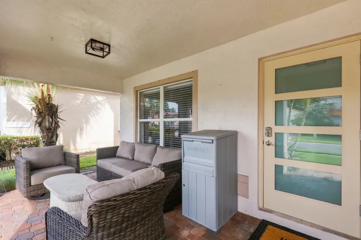 A welcoming front porch offers a comforting way to greet your guests.