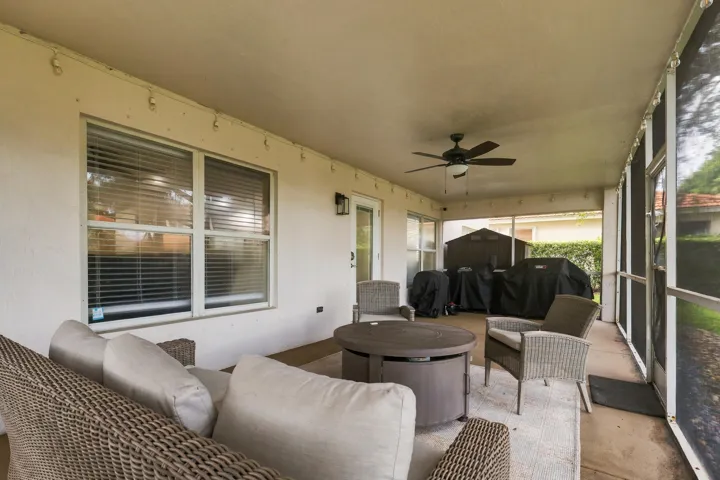 A 360 square foot covered and screened patio dramatically expands the home's entertaining space, with plenty of room to create both an outdoor living room and dining area for year round enjoyment. Whether hosting family and friends, dining outside, or simply unwinding at the end of the day, the combination of the expansive screened patio, lush hedges, full fencing, and complete rear privacy makes this a truly special outdoor setting.