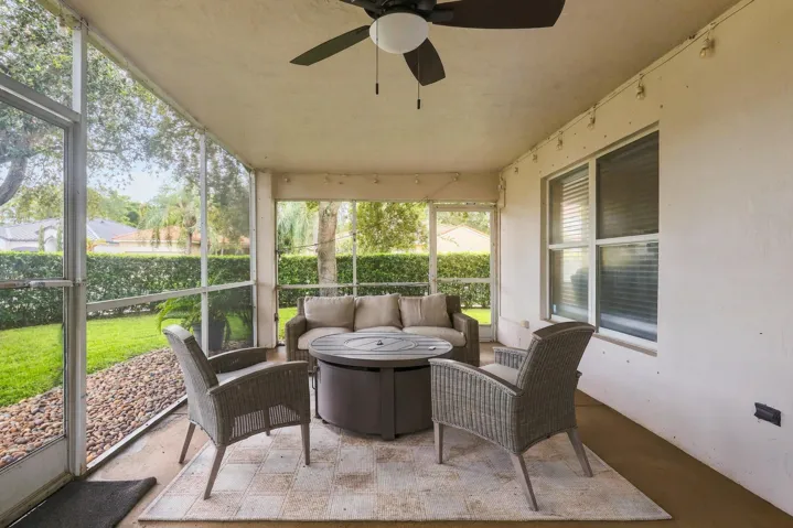A 360 square foot covered and screened patio dramatically expands the home's entertaining space, with plenty of room to create both an outdoor living room and dining area for year round enjoyment. Whether hosting family and friends, dining outside, or simply unwinding at the end of the day, the combination of the expansive screened patio, lush hedges, full fencing, and complete rear privacy makes this a truly special outdoor setting.