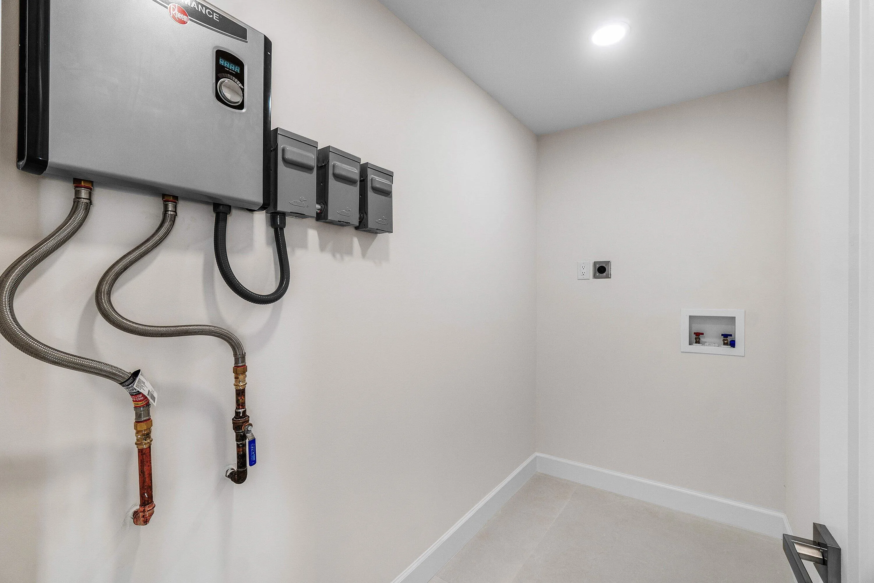 Tankless W/H & Laundry Room