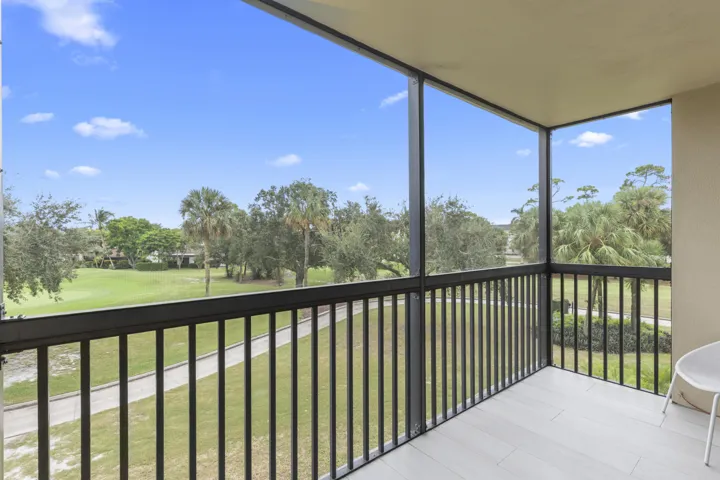 Corner condo with expansive golf course view
