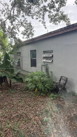 Side yard with mature landscaping
