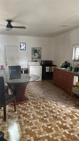 Kitchen and dining area with laundry