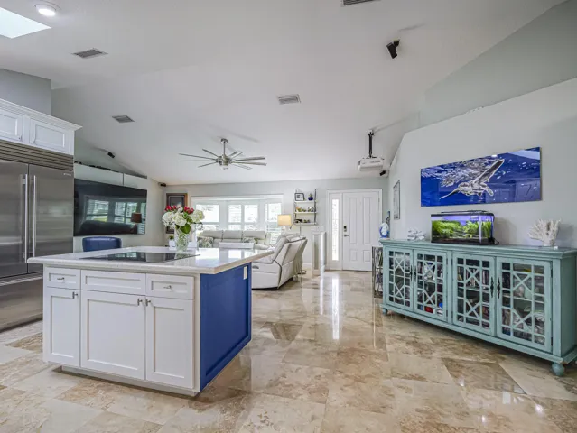Attractive kitchen opens to living space.