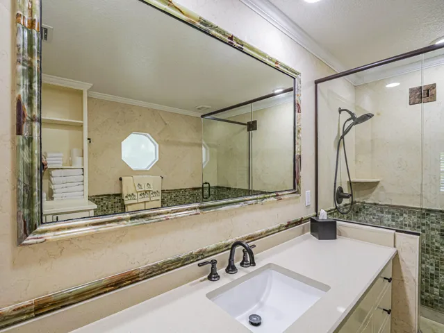 Bathroom with attractive tile and glass