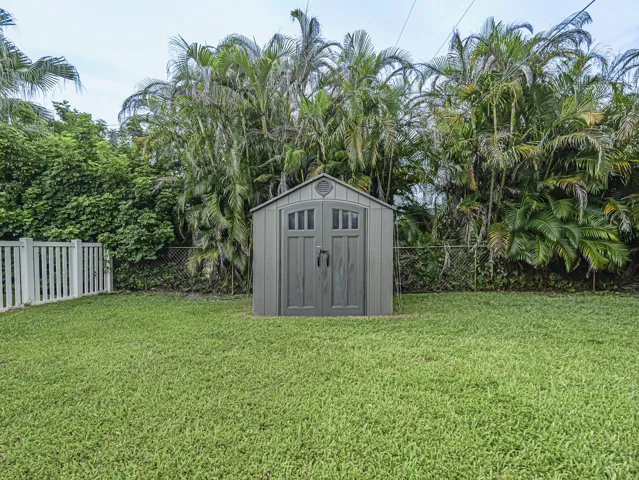 Handy storage shed with double doors.