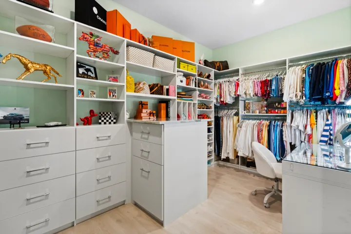 Custom Primary Closet with Peninsula