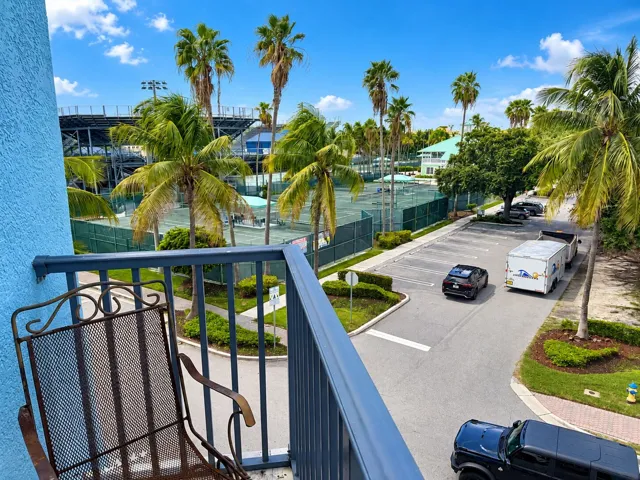Sunny Tropical Balcony Overlooking Tenni