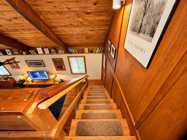 Warm Rustic Staircase Overlooking Cozy L