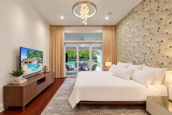 Serene Bedroom with Poolside Views