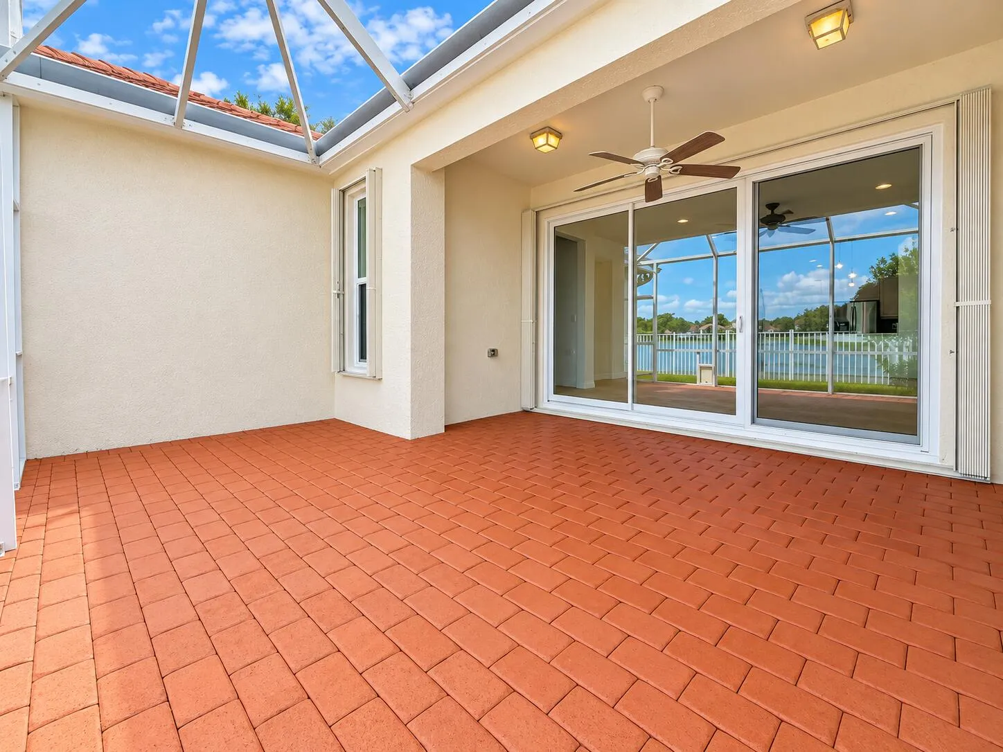 Bright Screened Patio with Lake Views