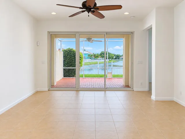 Empty Living Room with Waterfront Lanai