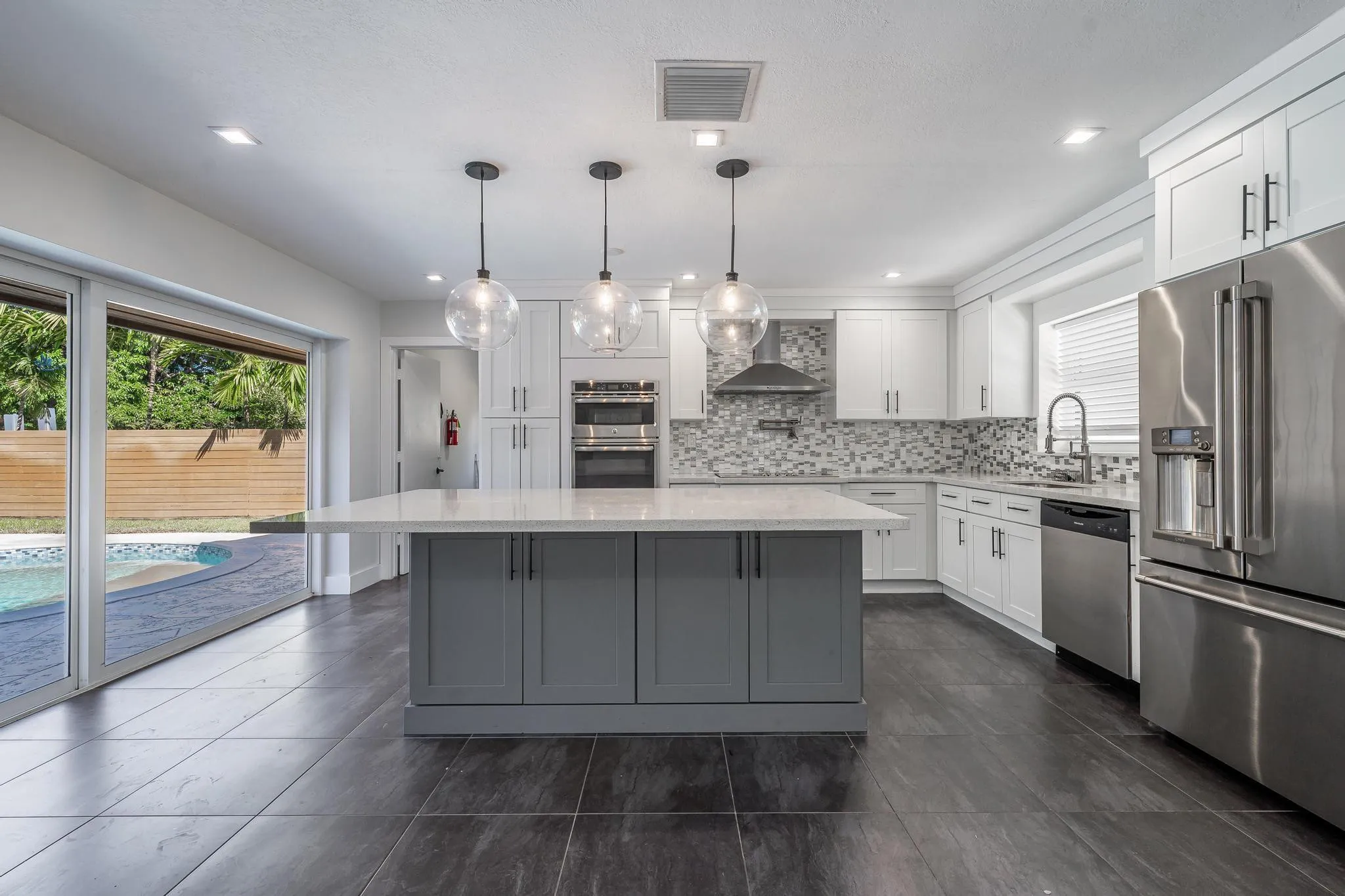 Renovated kitchen with quartz island