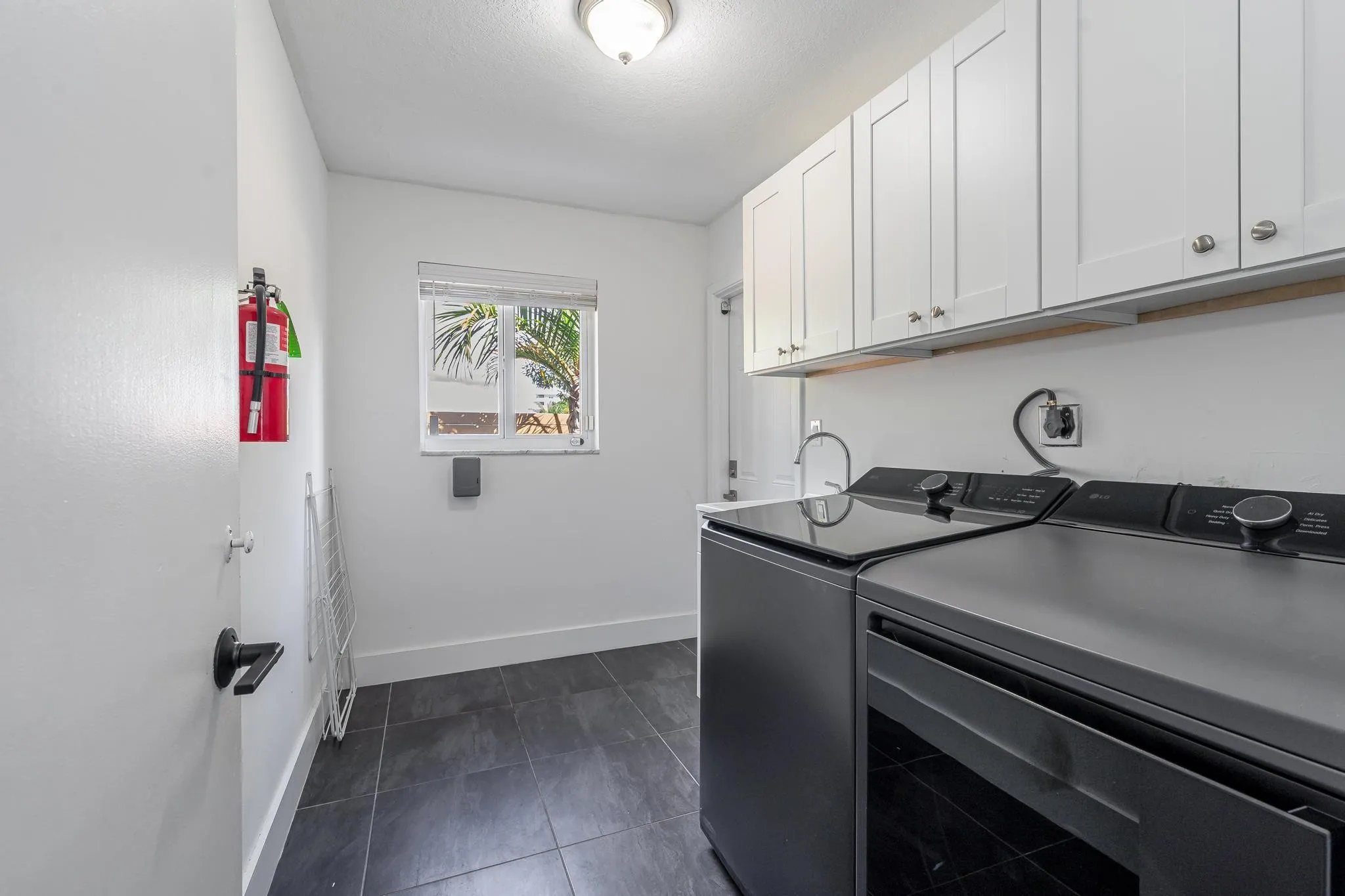 Laundry room with sink