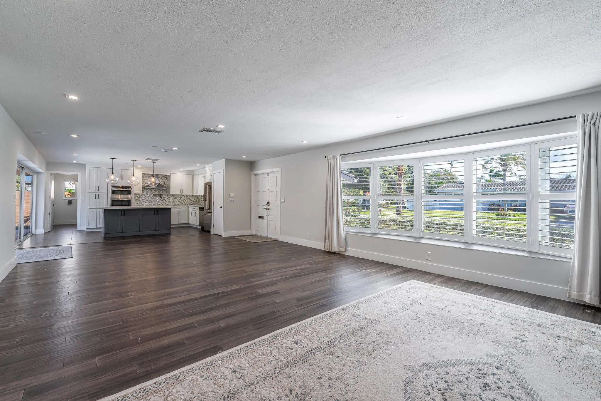 Bright living area with impact windows