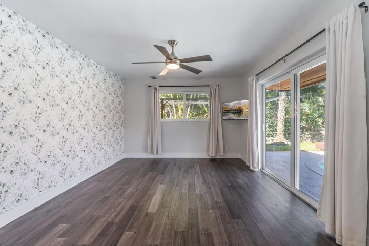 Primary bedroom with sliding glass doors