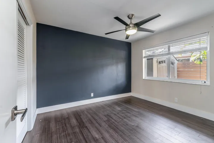 Bedroom with accent wall