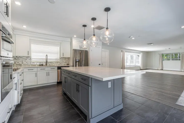 Kitchen open to living and dining